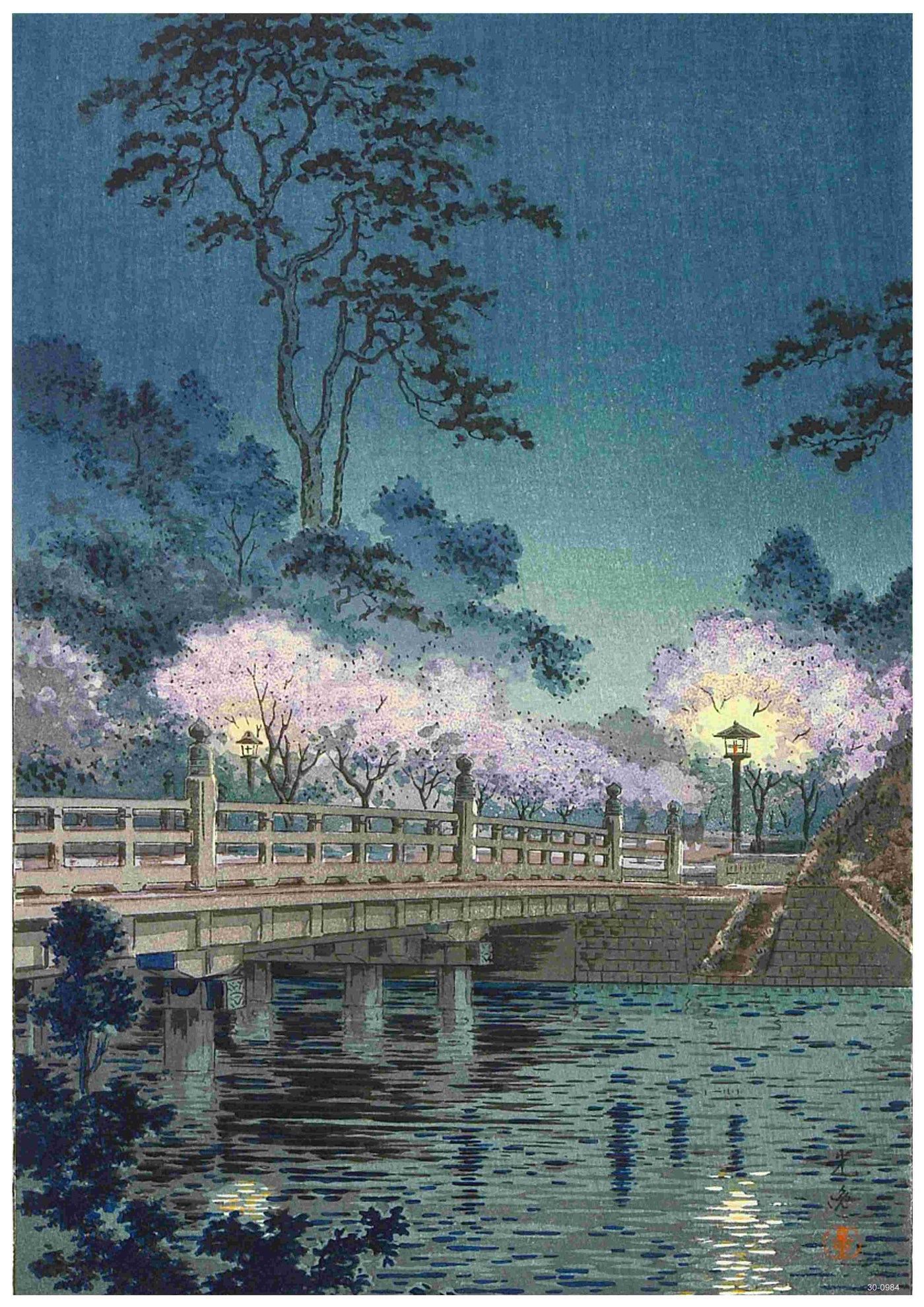 A3's Tsuchiya Koitsu - Beneki Bridge is an artwork depicting a serene night scene with a wooden bridge over calm water, printed on 250gsm Satin Paper. The bridge is lit by lanterns and surrounded by blooming cherry blossom trees, reminiscent of a Japanese Art Poster. Tall trees stretch into the night sky in the background.