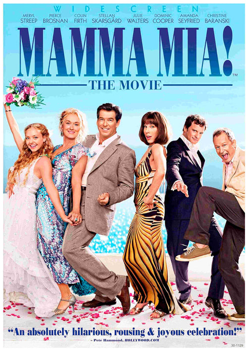 The cast of "Mamma Mia" from A3 beams in vibrant attire on a beach, with the movie's title displayed in bold blue letters above.