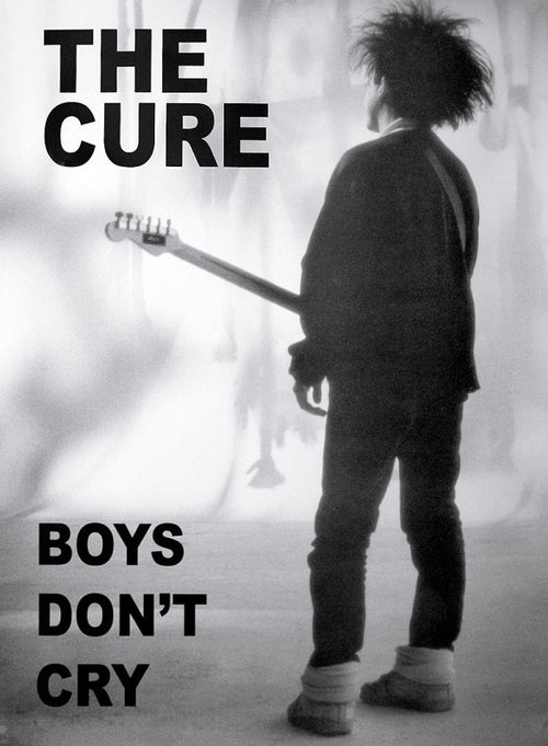 Black and white image of the cover for 'The Cure - Boys Dont Cry' by MUS 154. It features a person with disheveled hair standing and holding an electric guitar, facing away from the viewer. The text "THE CURE" and "BOYS DON'T CRY" is written prominently in bold letters. Perfect for any music collection on premium gloss paper.