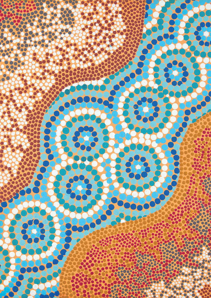 The Mitchell River by K Austin of Gunaikurnai, available through Blue Dog Posters, features vibrant dot painting with blue concentric circles, red, white, and yellow dots. Curved lines weave through the piece echoing the flowing patterns typical of Australian Aboriginal art prints.