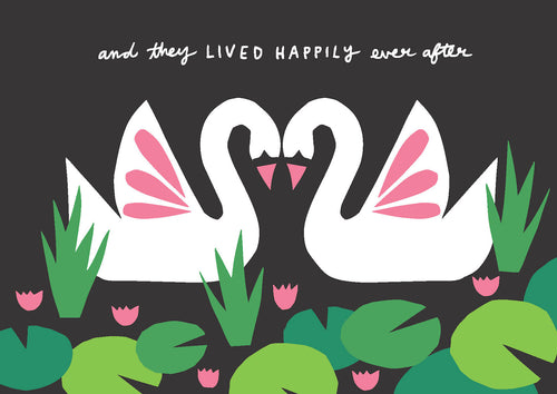 Swan Wedding by Badger & Burke for Blue Dog Posters showcases two white swans forming a heart with their necks amidst pink flowers and green lily pads, echoing mid-century design. Above them, 'And they lived happily ever after' is displayed on a dark background.