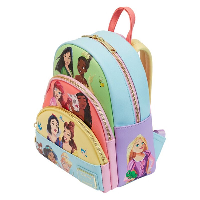 The Disney Princess Collage Mini Backpack by Blue Dog Posters features a vibrant array of Disney Princess characters. This colorful bag boasts three compartments with gold zippers, side pockets, and printed images of princesses on each section. It includes pastel shades of blue, pink, yellow, and purple.