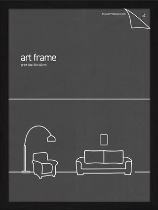 The "Classic Frame 30x40cm Black" by Blue Dog Posters features a black rectangular design measuring 33 x 40 cm, complete with a protective film in the top right corner. This minimalist frame showcases white outlines of a floor lamp, armchair, couch, and small picture frame on a wall. Combining durability and elegance, it uses plexiglass for a classic touch.