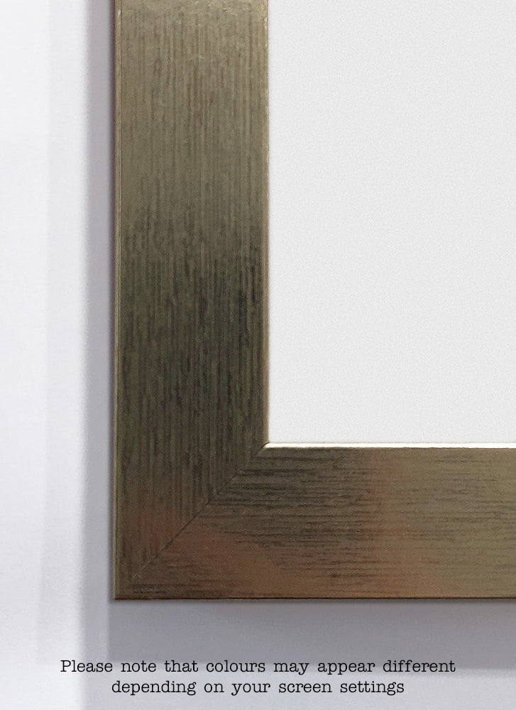Close-up of a metallic-looking corner of a picture frame with a light wood grain texture from our Classic Frame 61x91.5cm Gold by Blue Dog Posters. There is a note at the bottom reading, "Please note that colours may appear different depending on your screen settings.