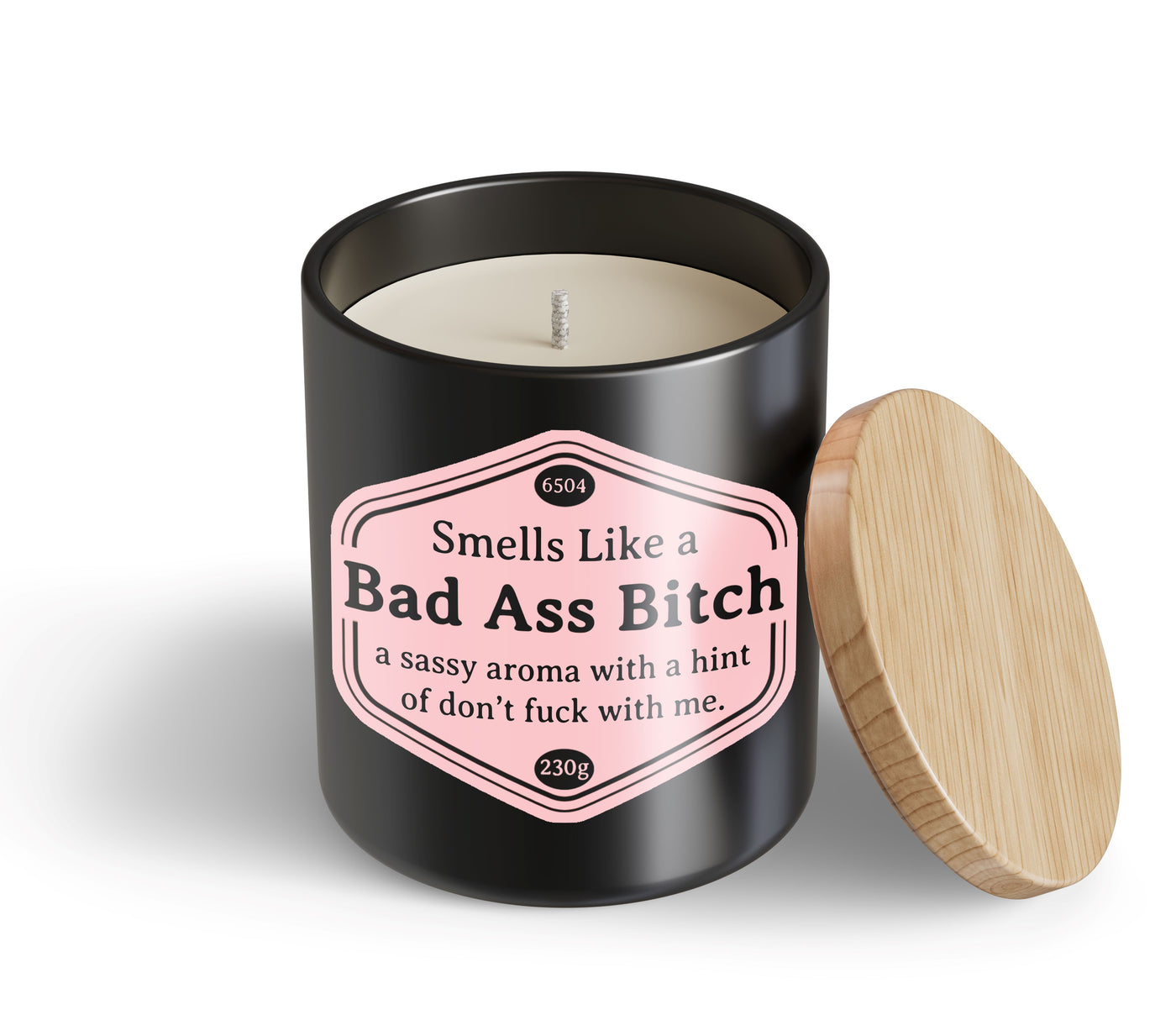 The Bad Ass Bitch Candle Hustle & Co by Blue Dog Posters features a black jar, wooden lid, and pink label with “Smells Like a Bad Ass Bitch – a sassy aroma with a hint of don’t fuck with me.”.