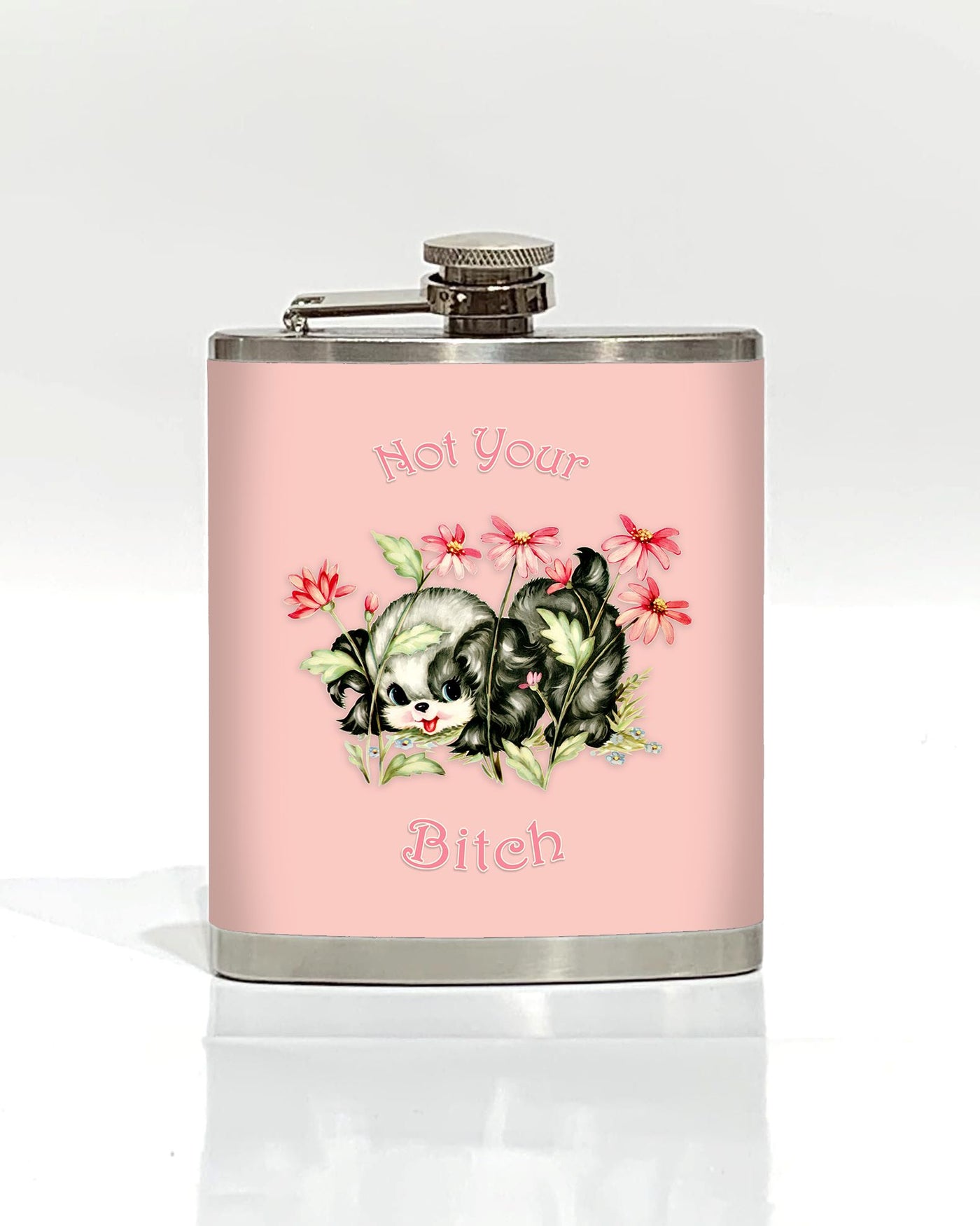 Part of our Cool Gifts Collection, the Blue Dog Posters' "Not Your Bitch Hip Flask" features a cute dog illustration amid flowers on a pink stainless steel background. Above and below the dog, the text reads "Not Your Bitch" in a playful font. The flask is showcased against a plain white background.