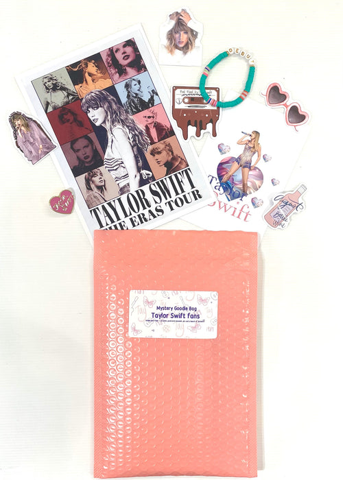 A pink Mystery Goodie Bag - Taylor Swift by Blue Dog Posters is surrounded by Taylor Swift-themed stickers, an enamel pin, a postcard, a bracelet, and heart-shaped sunglasses.