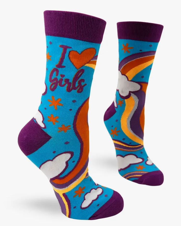 Introducing the I Love Girls Socks Ladies by Blue Dog Posters: These stylish and comfortable socks feature purple heels, toes, and cuffs. The vibrant blue background showcases the phrase "I love girls" with a heart symbol, along with playful rainbows, stars, and clouds. These Ladies' crew socks are an easy-care addition to your wardrobe.