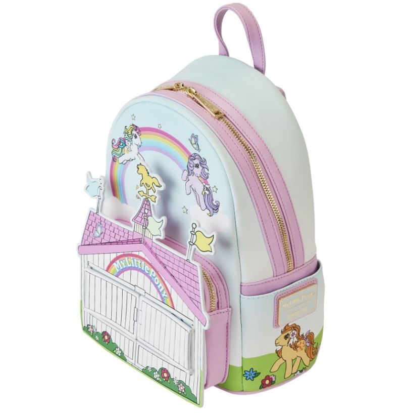 Join the celebration of My Little Pony's 40th Anniversary with the Blue Dog Posters' My Little Pony Stable Mini Backpack. This charming accessory features delightful unicorn and rainbow designs across two zippered compartments and a barn-shaped pocket. Enjoy a whimsical mix of pastel pink, blue, and yellow tones.