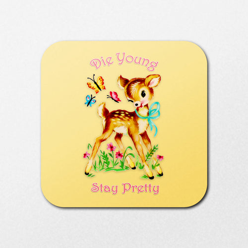 The "Die Young Coaster" by Blue Dog Posters features a vintage-style fawn with a blue ribbon surrounded by butterflies and flowers on a yellow background, along with the text "Die Young Stay Pretty" in pink.