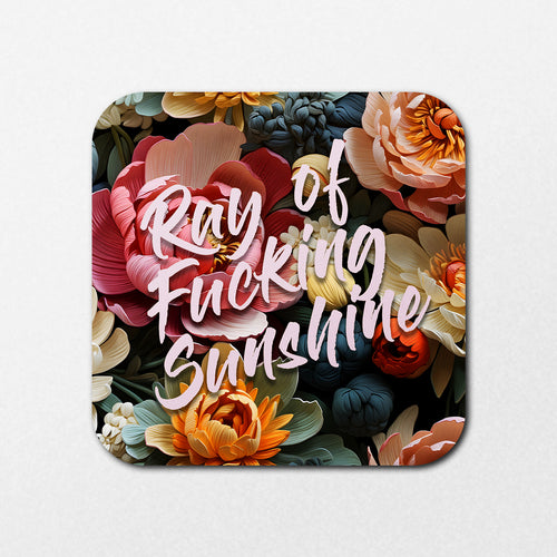 The Ray of Sunshine Coaster by Blue Dog Posters features the phrase "Ray of Fucking Sunshine" in bold white script, set against a backdrop with vibrant illustrations of red, orange, yellow, and cream roses and peonies.