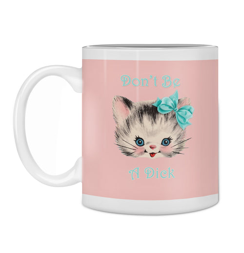 The Hustle and Co Mug - CAT Don’t be a Dick by Blue Dog Posters features a cute blue-eyed kitten with a bow and bold blue text. Set against a pink background, this dishwasher-safe mug is part of our Homewares Collection.
