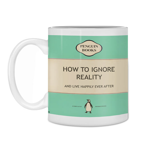 The Hustle & Co Book Mug - Ignore Reality from Blue Dog Posters showcases a sublimation-printed, retro-style book cover design. The white mug features a teal cover with a cream band in the middle, displaying "PENGUIN BOOKS" at the top and "HOW TO IGNORE REALITY AND LIVE HAPPILY EVER AFTER" prominently in the center. It also includes a charming penguin logo at the bottom and is dishwasher safe.