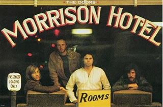 Four men are inside a building behind a “Morrison Hotel” window. Neon lights and reflections set the scene in The Doors - Morrison Hotel by MUS 199, perfect for any music collection or pop poster display.