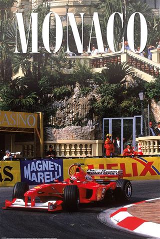 A Ferrari - Monaco Formula 1 car speeds through the iconic street circuit with "MONACO" boldly above. Brought to you by SPO 025, this Motor Sport Poster is perfect for fans and collectors of impressive, large-scale F1 art.