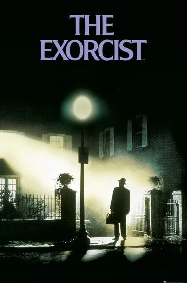 A silhouetted figure stands under a streetlight in front of a house, illuminated by bright window light. "The Exorcist (Arrival)" from the MTV 408 Movies & TV Collection boldly captures the eerie essence of this film classic poster.