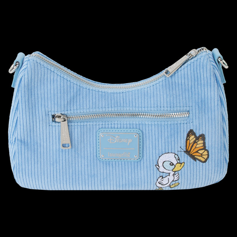 The Lilo & Stitch Springtime Daisy Crossbody by Blue Dog Posters is a light blue corduroy handbag featuring a front zipper pocket and silver hardware, adorned with a Disney logo patch and an image of a small white duckling looking at an orange and black butterfly. This charming Disney product has adjustable shoulder straps for added comfort.