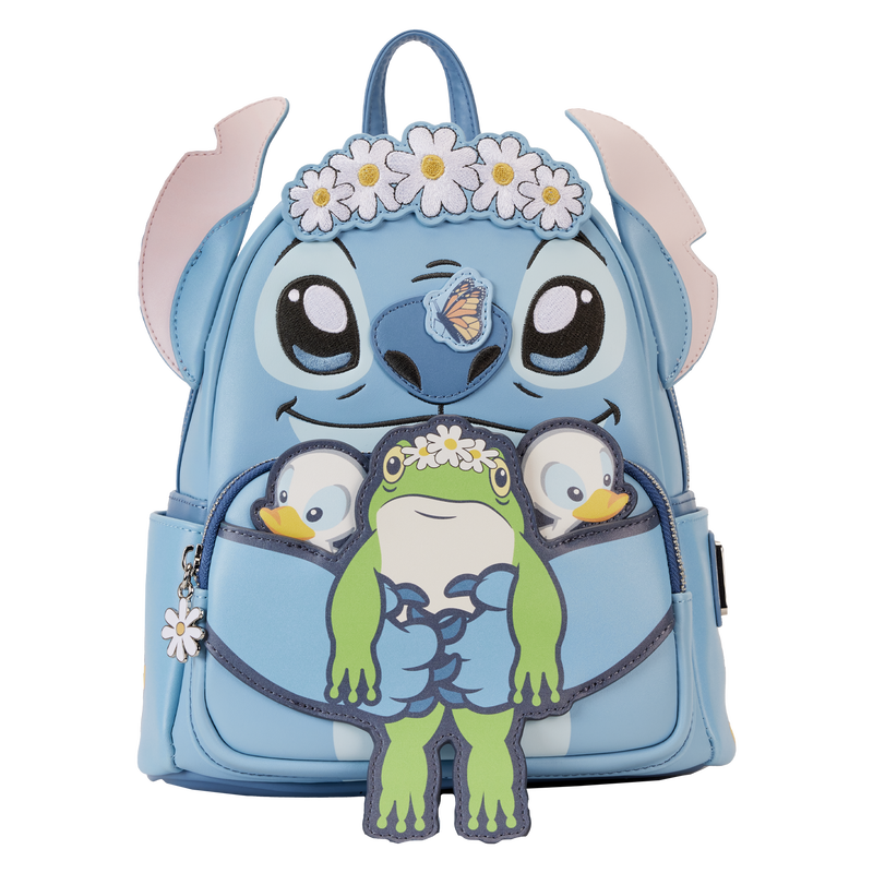 The Lilo & Stitch Springtime Mini Backpack by Blue Dog Posters is a blue vegan leather backpack featuring a large, playful face with big eyes and a daisy flower crown. This charming mini backpack includes pink ears and multiple attached accessories including a frog, two small duck characters, and a butterfly on the nose.