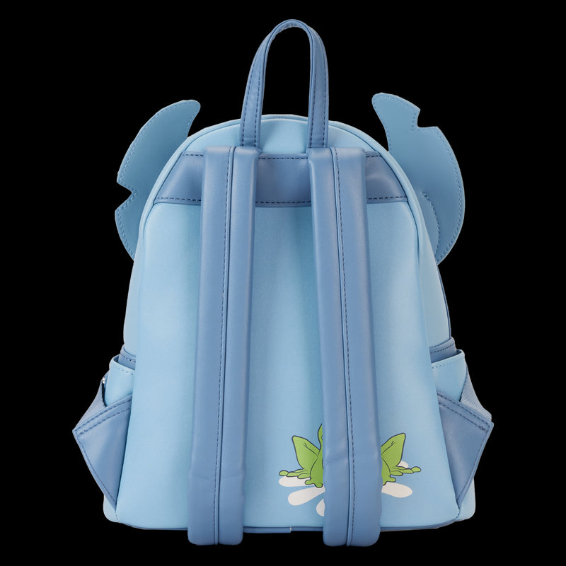 The Lilo & Stitch Springtime Mini Backpack by Blue Dog Posters is a small, light blue backpack featuring two adjustable straps and a top handle. This Vegan Leather backpack includes two side pockets, decorative blue ears and fins at the top sides, and an image of a green and white flower on the bottom back—ideal for your Springtime Stitch cosplay.