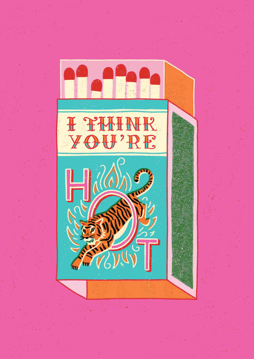 Illustration of an open matchbox with red-tipped matches. The box reads "I THINK YOU'RE HOT" with a tiger jumping through a flaming hoop in place of the letter "O" in "HOT." This vibrant pink piece is part of the Miriam Giudici Art Print series from Blue Dog Posters, titled "I think You're Hot by Miriam Giudici.