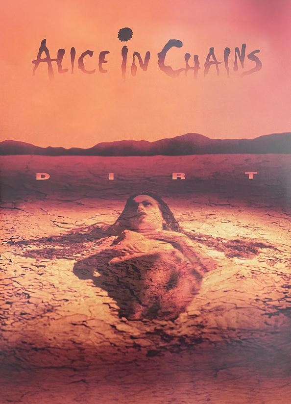 This MUS 012 Alice in Chains Dirt poster beautifully illustrates a person partially buried in cracked desert soil under an orange sky, with the band's name and album title elegantly displayed at the top. Printed on premium 150gsm gloss paper, it's a perfect addition to any music collection.
