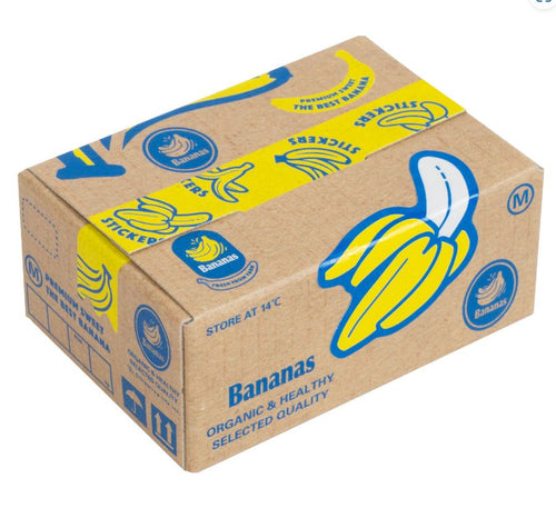 A cardboard box labeled "Japanese Mini Sticker Box Bananas" by Blue Dog Posters features blue and yellow banana graphics, stickers, and the phrases "Organic & Healthy Selected Quality" and "Store at 14°C.