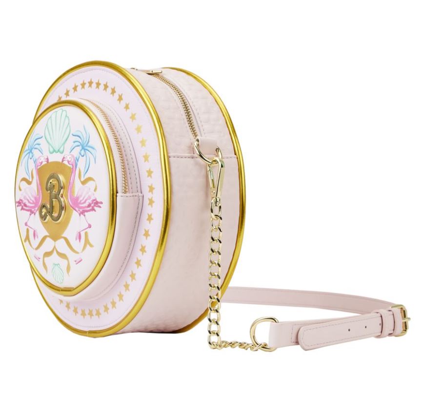 This round, pale pink Barbie the Movie Logo Crossbody Bag by Blue Dog Posters features gold trim and a strap. Decorated with stars around the rim, this elegant handbag includes a front pocket with playful illustrations of flamingos, seashells, and the number "3." It boasts a zippered closure and comes with a detachable gold chain handle.