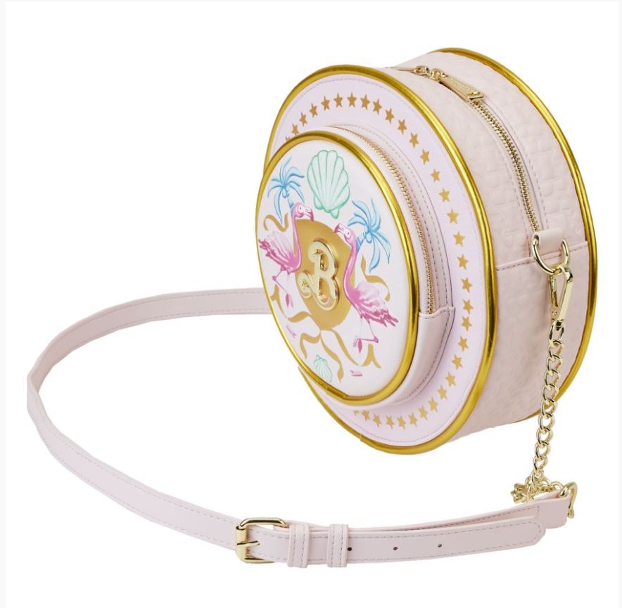 Description: The Barbie the Movie Logo Crossbody Bag by Blue Dog Posters features a round shape with a pink strap and gold hardware. It showcases an outer pocket adorned with flamingos, seashells, and the Barbie Logo. The main compartment has a gold zipper with chain detail, while gold stars encircle the front design.