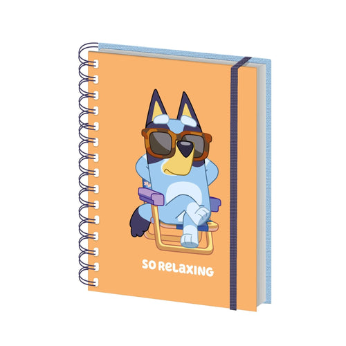 The Bluey So Relaxing Wiro Notebook by Blue Dog Posters features an A5 orange cover with a blue cartoon dog in sunglasses on a beach chair and "SO RELAXING" text—perfect official Bluey merch for fans.