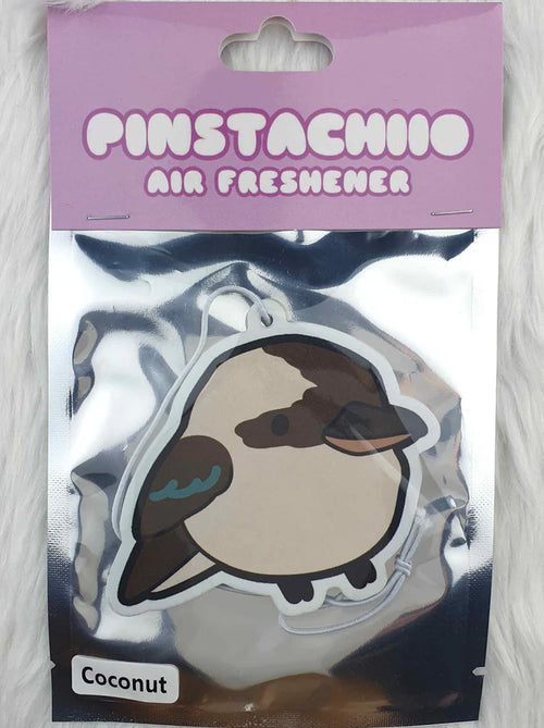 A packaged air freshener labeled "Kookaburra Coconut Air Freshener" by Blue Dog Posters shows a cute cartoon bird, has a purple header, shiny silver background, and a tag indicating its coconut scent.