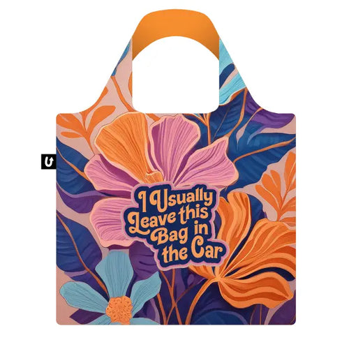 The Blue Dog Posters Car Caddy Foldable Tote Bag has an orange and purple floral design, a wide orange handle, black tag, and center text: "I usually leave this bag in the car." Made from recycled PET—perfect for eco-friendly shopping.