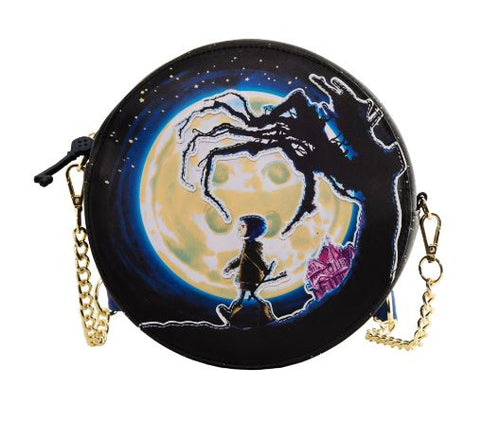 The Blue Dog Posters Coraline - Moon Crossbody is a round, vegan leather bag showcasing an illustration of a child with a bat walking across a branch against a large full moon. The scene includes a gnarled tree and a pink castle in the background. This crossbody bag features gold chain straps and a black zipper.