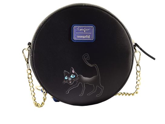 The Coraline - Moon Crossbody by Blue Dog Posters is a round black vegan leather crossbody bag featuring a whimsical drawing of a black cat with vivid blue eyes. The bag has a gold chain strap and includes a small blue rectangular tag at the top, marked "Loungefly.