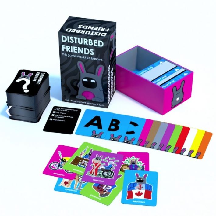 The ultimate party game, "Disturbed Friends" by Blue Dog Posters, is shown with its box open to reveal numerous colorful cards featuring illustrations and text—some with explicit language. Several cards are spread out against the packaging's cartoon rabbit design.