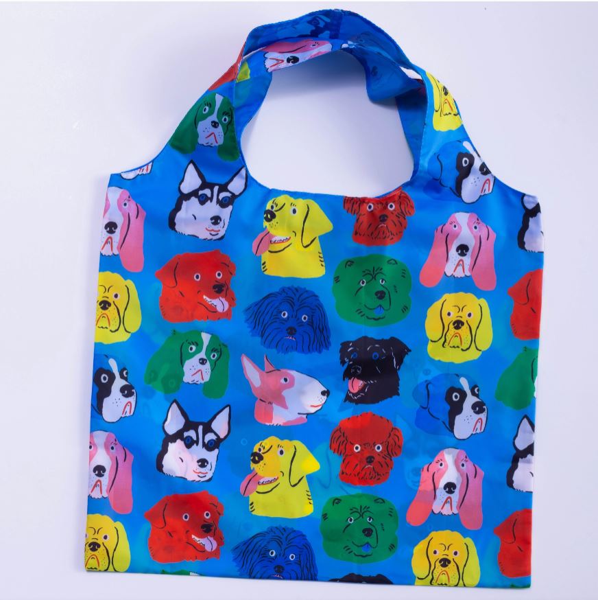 The Dogs Art Sack from Blue Dog Posters is a reusable blue shopping bag showcasing an array of colorful dog illustrations. Part of the Eco-friendly Art Sacks collection by Kristina Micotti, these dogs are depicted in various breeds and vibrant hues like yellow, red, green, and pink on 100% recycled rPet material. The bag features a single handle and a square shape.