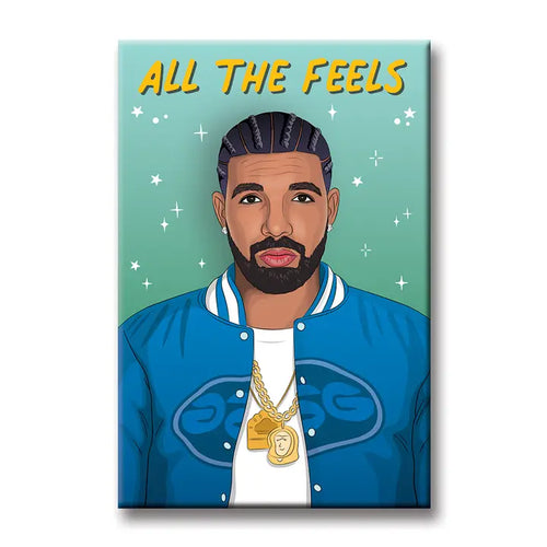 Blue Dog Posters' Drake Magnet features an illustration of a man with braided hair, beard, gold chains, blue jacket, and white shirt on a teal starry background. "ALL THE FEELS" appears above in yellow letters.