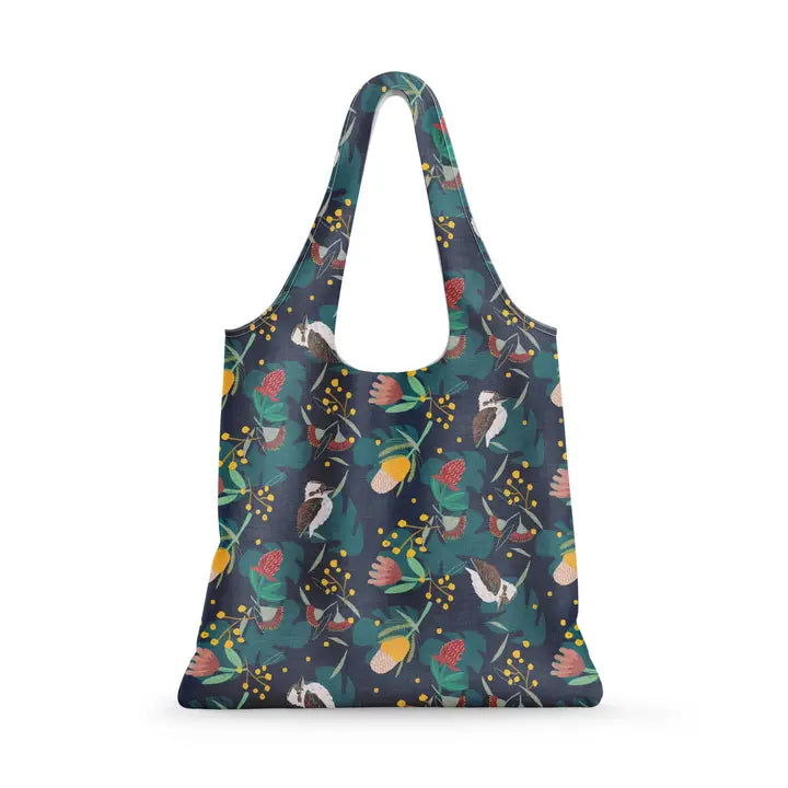 The Blue Dog Posters Floral Kookaburra Reusable Shopping Bag features a dark background with vibrant floral and bird designs. With wide handles, this eco-friendly tote combines style and sturdiness for carrying your items.