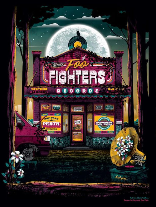 An illustration showcases a retro record store named "Foo Fighters Records," illuminated by neon lights, with the surrounding scenery of trees and a full moon. Limited Edition posters featuring the Foo Fighters Perth Nov 2023 concert from Blue Dog Posters are displayed, alongside a vibrant pink van. Capturing the essence perfectly, an individual in a hooded jacket sits on the nearby sidewalk.