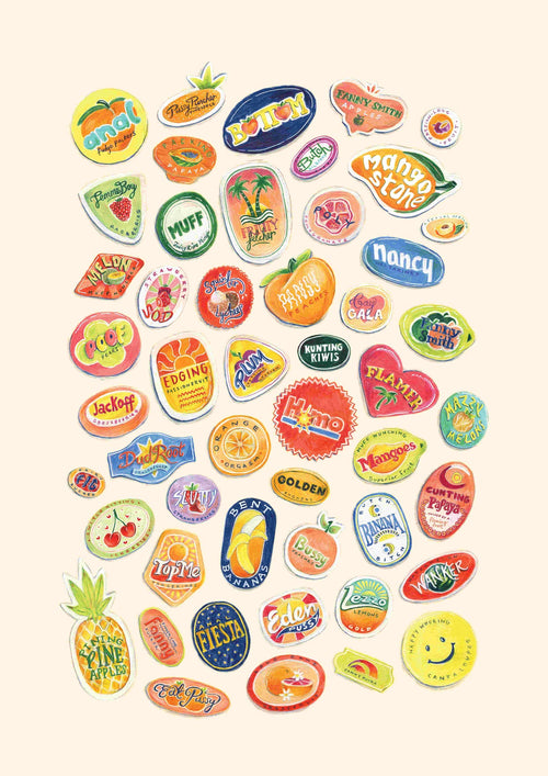 A collection of colorful fruit stickers from the "50 Up: Fruity by Amy Blue" set, arranged in a playful pattern on a light background. These "fap" brand stickers feature various fruit names and playful designs, including pineapples, kiwis, peaches, and citrus fruits, each labeled with a unique brand or logo.