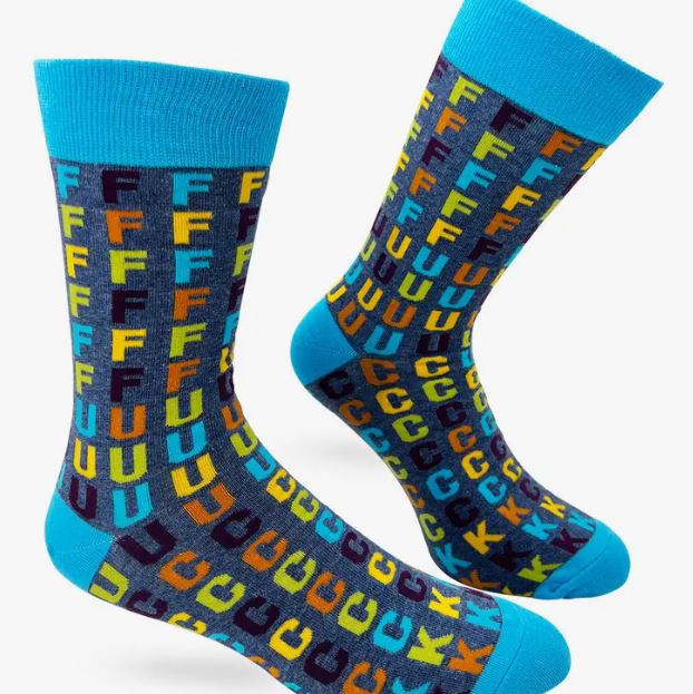 Introducing the FUCK Socks Mens by Blue Dog Posters—these brightly colored novelty crew socks, boasting a vibrant design with a humorous flair. The pattern features the letters "F," "U," "C," and "K" in an array of colors such as blue, yellow, orange, and green on a dark blue background. Adding to their unique look, the toe, heel, and band are solid light blue.