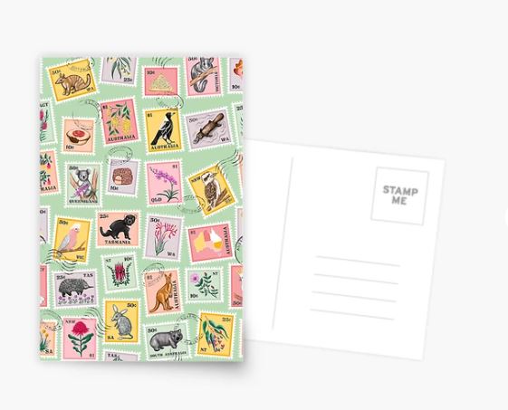 The G'Day from Australia Postcard by Blue Dog Posters is a postcard and envelope set showcasing a vibrant collection of stamps with diverse illustrations, such as animals, plants, and landscapes. The back of the postcard includes defined areas for a stamp and address, set against a white background.