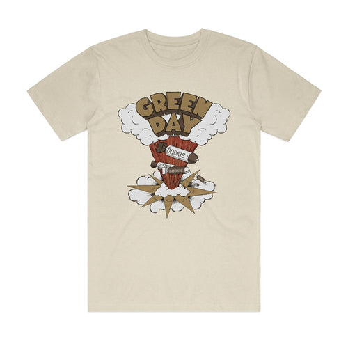 The Green Day Dookie T-Shirt Sand 2XL by Blue Dog Posters features a cartoon crate with "COOKIE" and "Dookie" signs, smoke clouds, comic explosions, and “GREEN DAY” in bold brown letters—celebrating the iconic punk rock album.