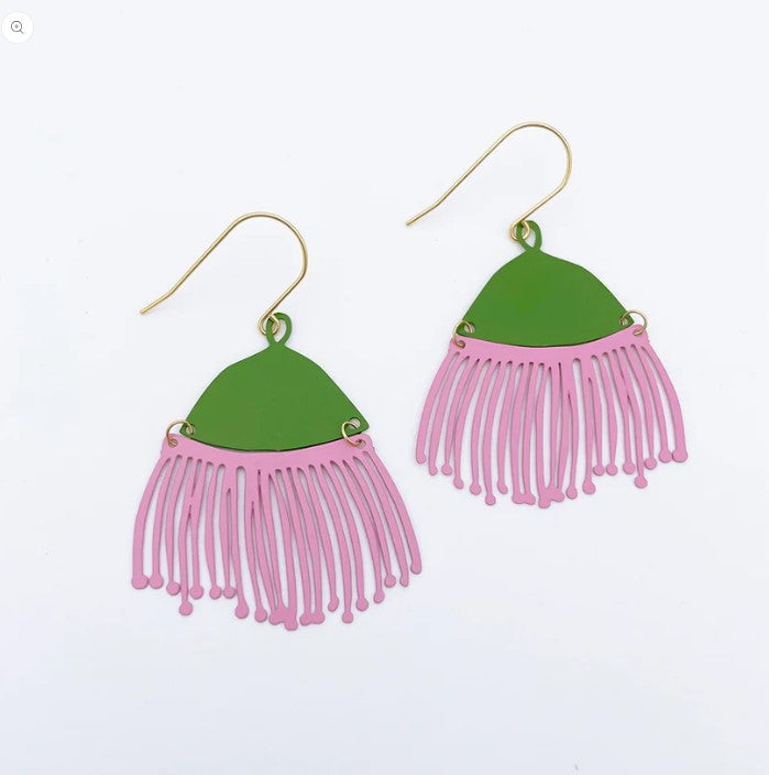 Introducing the Denz Gum Blossom Pink & Lilac Earrings by Blue Dog Posters: These lightweight statement earrings feature green, leaf-shaped tops with pink, fringe-like dangling elements. Crafted from recycled stainless steel and adorned with gold hooks, they showcase a playful, nature-inspired design. Photographed against a plain white background.