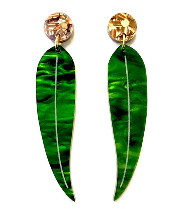 A pair of elegant Blue Dog Posters' Gum Leaf Earrings Green & Bronze featuring large marbled gum leaf green leaves, attached to sparkling circular studs. The leaves are long and slender, while the studs add a touch of glamour with their golden, gem-like appearance. These exquisite handmade earrings make a stylish statement.