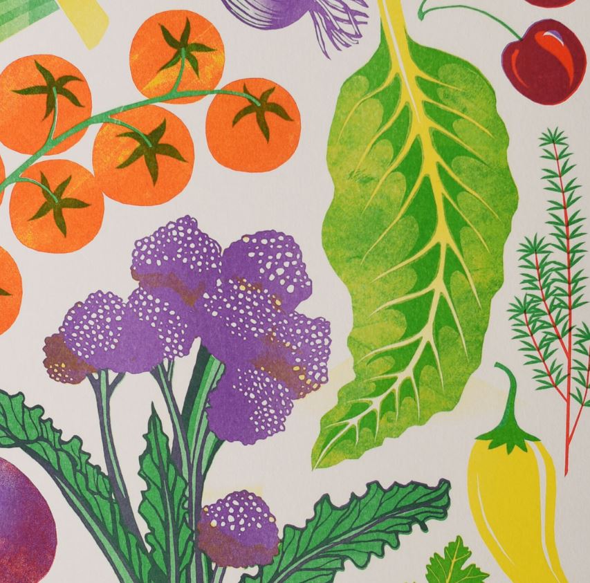 The "Home Grown Riso Print" by Printer Johnson from Blue Dog Posters depicts colorful vegetables and herbs, featuring cherry tomatoes, a large green leaf, purple cauliflower, cherries, rosemary, an eggplant, and a yellow pepper on a white background.