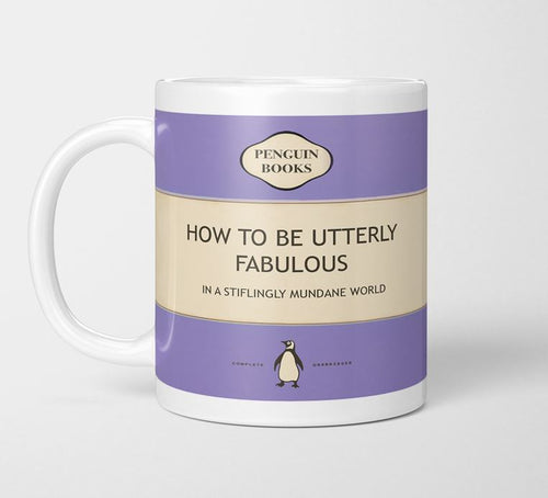 The Hustle & Co Book Mug - Utterly Fabulous by Blue Dog Posters is a white mug from the Homewares Collection that features a book cover design resembling a Penguin Books classic. The text reads: "Penguin Books" and "HOW TO BE UTTERLY FABULOUS in a stiflingly mundane world." With its purple background, classic Penguin Books logo, and dishwasher-safe convenience, this mug is both stylish and practical.