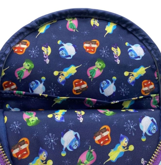 A close-up image of a Disney Pixar backpack with a colorful pattern featuring characters from the animated movie "Inside Out." The Inside Out Mini Backpack by Blue Dog Posters shows Joy, Sadness, Anger, and Disgust in various playful poses on a dark blue background.