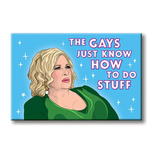 Blue Dog Posters' "Jennifer Coolidge The Gays Magnet" features a glamorous blonde woman in a green dress on a sparkling blue background, with bold pink and white text: “The gays just know how to do stuff.”.