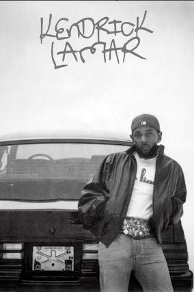 A man in a jacket and cap stands in front of a car, looking at the camera. Above him, "Kendrick Lamar - GNX" and "MUS 359" are written in bold, stylized text. The black-and-white image showcases the product branding.
