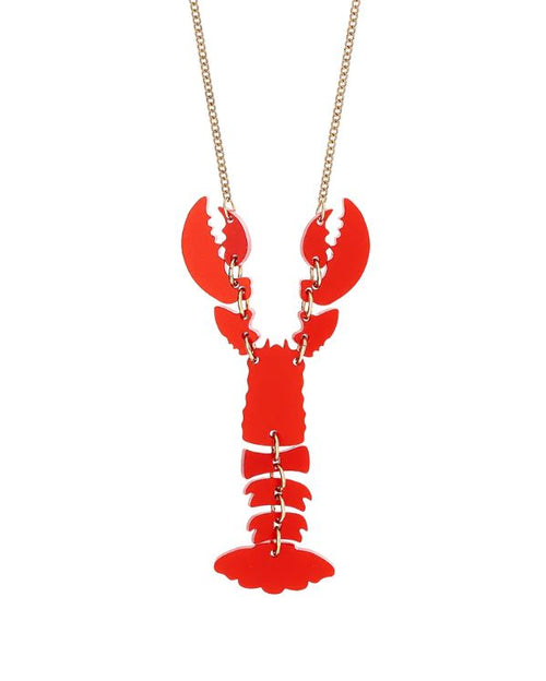 Discover the allure of Blue Dog Posters with the Lobster Necklace - Ruby Shimmer, showcasing a pendant in an articulated lobster design. The segmented red pieces are meticulously linked to create movement on a gold-colored chain.